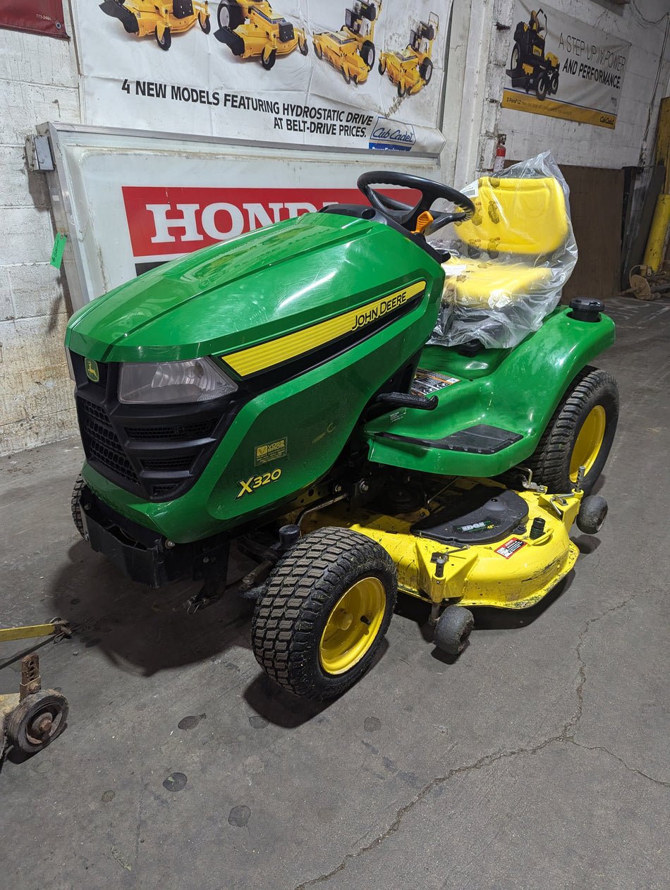 John Deere X320 with 48" mower deck (used equipment)