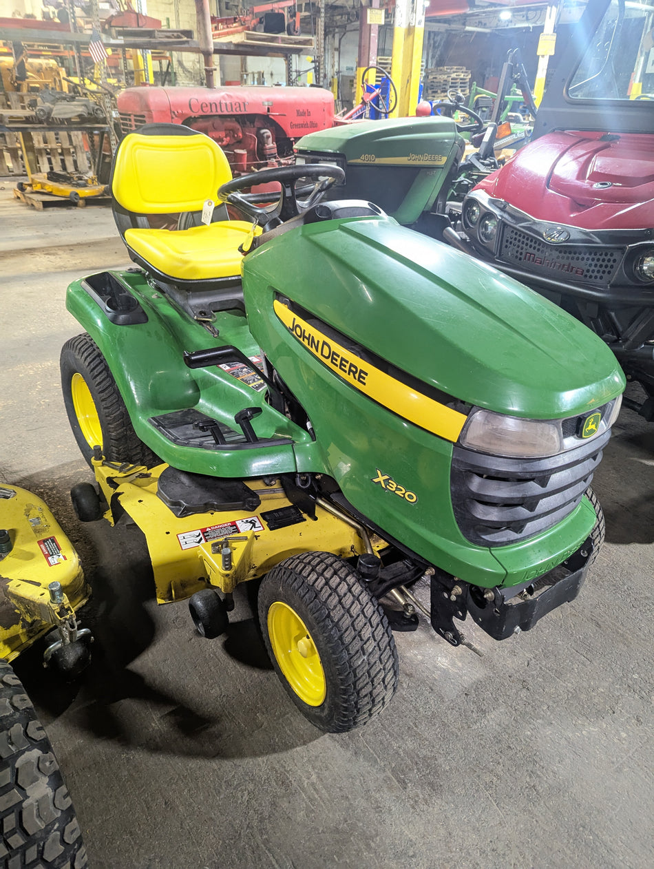 John Deere X320 (48") used riding mower (1365 hours)