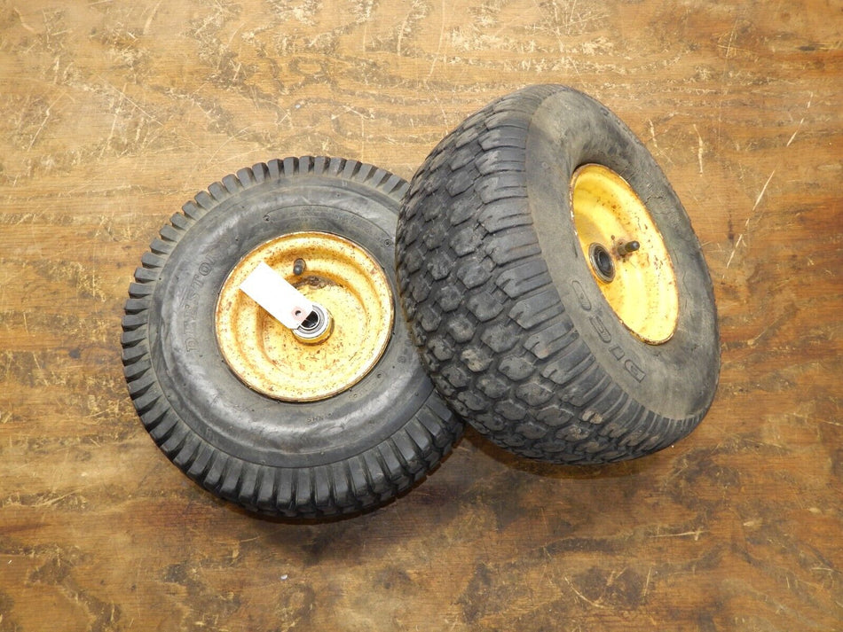 John Deere LX173 Front Wheel Tire Assembly (2) AM127303 HOLDS AIR